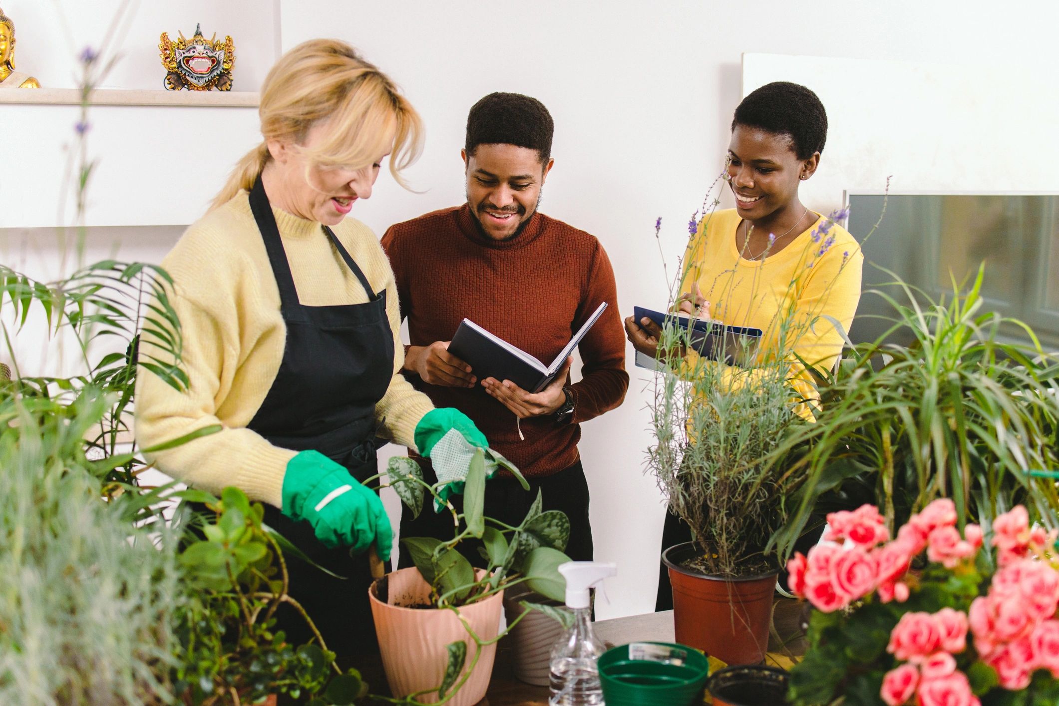 Adults participating in a gardening lesson